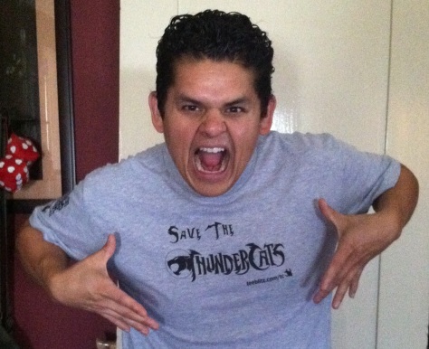 Aris Alvarado in a Save The Thundercats T-shirt